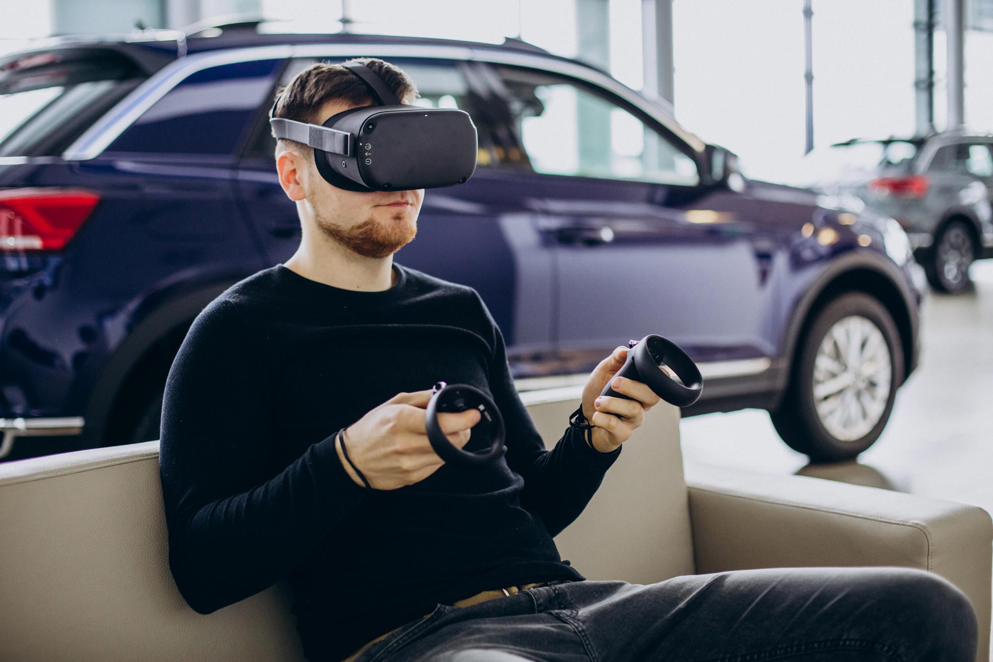 Man with vr headset in a car rental